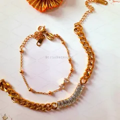 For a modern and chic couple, this Bhai Bhabhi set is perfect. It features a stylish gold-plated chain bracelet for bhai and a matching delicate one for bhabhi, both with sparkling crystal details.