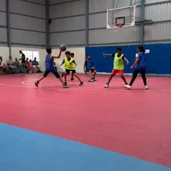 An action shot from our 3x3 tournament, showcasing the professional quality of our court surface.