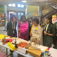 Inspecting the wonderful craft and sculpture work at a student art exhibition. It's amazing to see the creativity and skill displayed by these budding artists in various mediums.