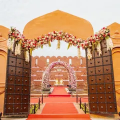 The entrance to your royal wedding should be just as grand. I ensure every detail, from the massive gates to the floral decor, sets the tone for a magnificent celebration from the moment guests arrive.