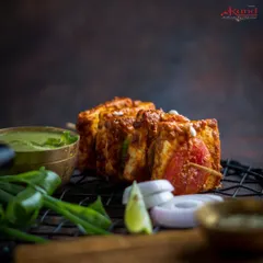 For our vegetarian guests, our Peshawari Paneer Tikka is a true delight. We use the softest paneer, marinated and slow-cooked in the tandoor until it gets that perfect char. It’s a healthy and delicious starter for any occasion.