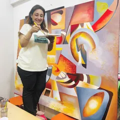 A smile of satisfaction as the painting comes together. My process is deeply personal, and I find immense joy in seeing a client's vision take shape through my hands, brushstroke by brushstroke.