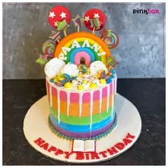 We love making birthdays extra bright with cakes like this rainbow drip design. It’s packed with fun details like lollipops and sprinkles, showing how we can turn any kid's birthday party into a colorful, sweet celebration.