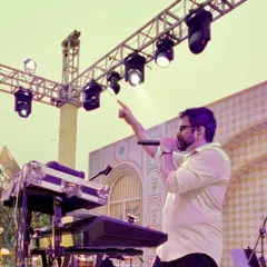 Johaan commanding the stage during an outdoor wedding celebration. We know how to work a crowd and make sure the energy never dips.