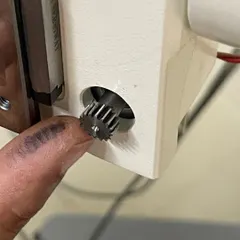 A close look at a small metal gear, a critical component in many machines. We teach kids to pay attention to the small details, because sometimes the smallest part can be the key to a successful repair.