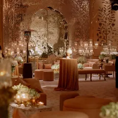 The main hall for the Sufi night, featuring a spectacular mirrored archway that reflects the candlelight beautifully. We used plush, low seating in pastel tones to create a comfortable and opulent lounge feel.