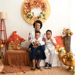 A portrait of a mother and her two sons, captured during a visit from an international client. Our studio is a welcoming space for families from all over the world.