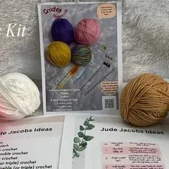 Take a look at everything packed into my Crochet Beginners Kit. You get four different colors of yarn, printed guides explaining all the crochet terms, and all the tools you need. I designed it to be a complete starter pack so you can begin crafting right away.