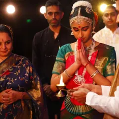 A sacred moment from the Arangetram ceremony. My student Sahana seeks blessings before her performance, a tradition that connects the dancer to the divine and their lineage.