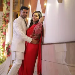 Another lovely couple shot. My client looks absolutely radiant in her red saree, with makeup that enhances her happy glow.