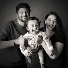 A classic black and white family portrait that is absolutely bursting with joy. Sometimes the most simple shots, focusing purely on emotion, are the most powerful.