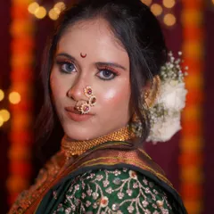 A closer look at the radiant makeup for this Nauvari bride. The glowing skin, combined with a bold eye and traditional jewelry, creates a look that is both regal and timeless.
