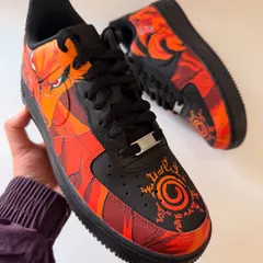 This shot highlights the toe box of the Kurama sneakers, where I painted the iconic Kurama seal. It's these small, meaningful details that make a custom pair special for a true fan.