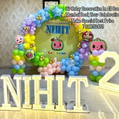 For the little ones, I bring their favorite characters to life. This Cocomelon theme for a 2nd birthday includes a colorful balloon arch, a personalized backdrop, and large light-up marquee letters with the birthday boy's name, NIKIT.