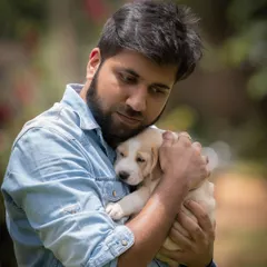 There's nothing like the gentle comfort of holding a puppy. My love for animals is at the heart of everything I do, and it's what drives me to capture their spirit.