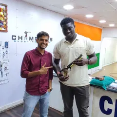 Another great shot of @istanboss checking out an air pistol at our Andheri range. We love introducing new people to the sport of shooting.