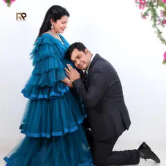 We believe in capturing the connection between partners. This tender moment, with the father-to-be listening to the baby bump, is a memory you will both cherish forever. Our couple sessions are designed to be relaxed, intimate, and full of love.