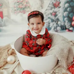 Celebrating the magic of Christmas with the biggest smile! This winter wonderland setup is one of my favorites for holiday photos.