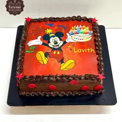 A classic photo cake featuring the one and only Mickey Mouse. This square chocolate truffle cake is perfect for a young child's birthday, with a bright, colourful edible image and chocolate piping.