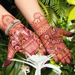A stunning example of a mature henna stain, showcasing the deep color against the skin.