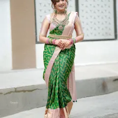 A full-length shot of the same client, showing how the jewellery, including the oddiyanam, perfectly complements her traditional attire.