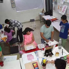 A candid shot of our busy classroom, captured by our CCTV. You can see students of different ages working on their projects with guidance from our instructors.