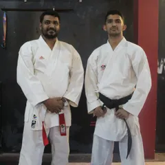 Pictured here with a senior instructor during a belt grading test. We believe in learning from the best and fostering relationships with other respected academies to benefit our students.