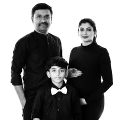 The black and white version of our timeless family maternity portrait, adding a classic and dramatic feel to the image.