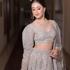 Her radiance is like the moon, serene and enchanting. For her engagement, I created a soft, glowing look with shimmery eyes and a nude lip.