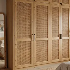 A beautiful example of Japandi design, this wardrobe features natural wood and rattan panels, bringing warmth and texture to the bedroom.