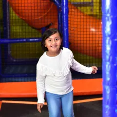 Bouncing with joy on our enclosed trampolines. This is a safe way for kids to burn off energy and practice their jumps.
