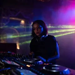 In my element, curating the journey for the dance floor. This shot was taken during a Soul Fest event, where I focus on blending tracks to build energy from the first to the last record.