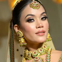 A classic smudged kohl look. This technique is timeless and adds a beautiful intensity to the eyes, making them the focal point of the entire look.