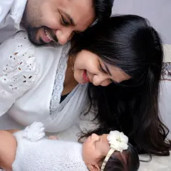 Tiny miracle, wrapped in love and dreams. We capture the adoration in the eyes of new parents.