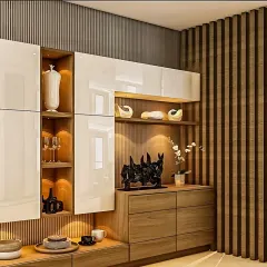 This custom crockery and bar unit features a mix of high-gloss white cabinets and wood drawers. We used vertical wood slats and integrated lighting in the open shelves to highlight decorative items.