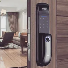 The UNIQ smart door lock installed on a wooden main door, blending seamlessly with the home's interior. This push/pull model offers advanced features like anti-theft passwords and a built-in doorbell for complete security.