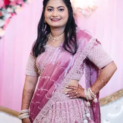 A portrait of the bride in her reception lehenga, showing the transition from the traditional Marathi wedding ceremony to the evening celebration.