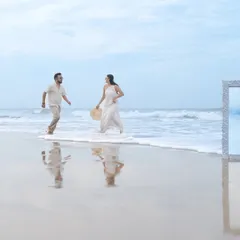 I love getting creative with props to tell a unique story. On the beaches of Goa, we used this ornate mirror to create a surreal, artistic reflection of the couple's bond against the vastness of the ocean.