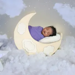 I love creating dreamy, magical scenes like this 'Baby on the Moon' setup. It's perfect for capturing a peaceful, sleeping newborn.
