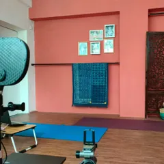 Our online teaching setup includes proper lighting and camera equipment. This allows our instructors to demonstrate postures clearly and observe students to provide live feedback and corrections.