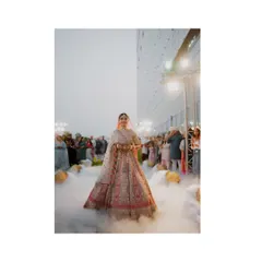 The bride's entrance is a moment suspended in time. I used a low-angle shot with theatrical smoke to create this ethereal, almost magical atmosphere, making her look like she's floating toward her future. It’s about making the grand moments feel deeply personal and unforgettable.