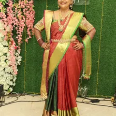For a special event, I created this unique double drape look for the lovely Geeta ma'am. This artistic style uses two pallus to create a layered and dramatic effect, perfect for making a statement.