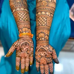 This design showcases royal Rajasthani motifs, including palace architecture (jharokhas), marching elephants, and a bride in a doli (palanquin) on the palms.