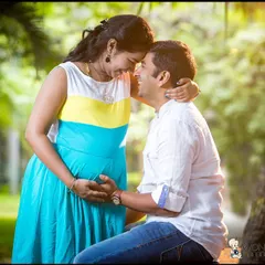 The connection between partners is a huge part of this journey. I focus on finding those natural, happy moments, like this one in a quiet park, to create warm and intimate couple portraits you'll cherish.