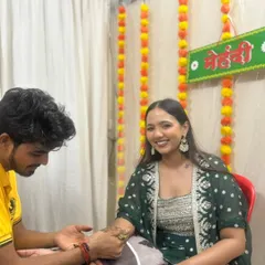 A happy bride during her mehandi ceremony. Seeing my clients smile is the best part of my job. Free home service is available across Mumbai!