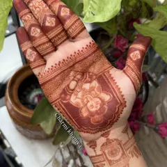 Here is the stunning stain of the Ganesha mehendi. The rich, dark color shows the quality of the henna and makes the divine portrait look even more beautiful.