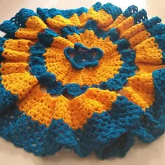 Yes, you can learn to make this! This beautiful dress for a little one was made entirely with crochet. My beginner classes will teach you the foundational skills to create everything from simple patterns to lovely garments like this one.