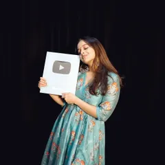 Our co-founder Mitali sharing a happy moment with our YouTube Silver Play Button. Every like, comment, and subscription helped us get here, and we are so incredibly grateful.
