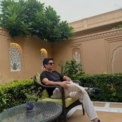 Relaxing in a quiet courtyard in Jaipur before a big event. Taking a moment to chill and get centered is key to delivering a high-energy performance.