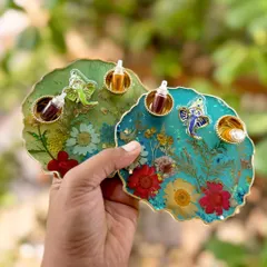 Add a pop of elegance to your celebrations with my handcrafted puja thalis. This floral design with a Ganesha idol is perfect as a return gift for weddings, festivals, or any special event.